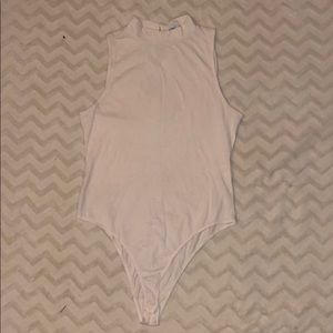 High-necked, white, sleeveless bodysuit